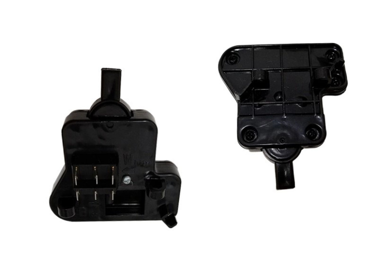 Spínač přední/zadní páčky pro dvoumístné vozidlo BMW X6M s bateriovým pohonem.